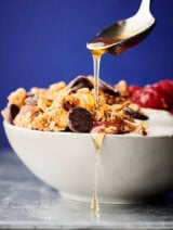 Almond Butter Granola. A healthy, can be gluten free and vegan recipe made with crunchy almond butter, coconut oil, honey (or agave), maple syrup, oats, almonds, dark chocolate chips, and more! Quick. Easy. Delicious! showmetheyummy.com #almondbutter #granola #healthy #glutenfree #vegan #snack #chocolate