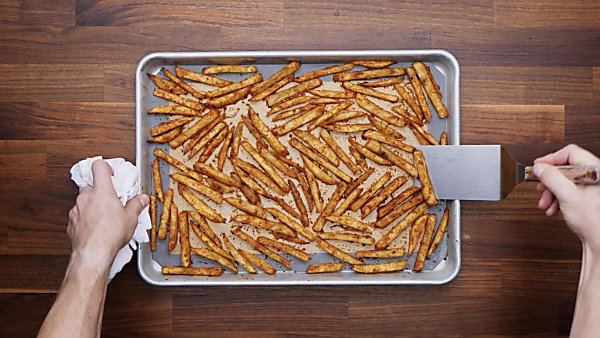 finished cajun fries on baking sheet