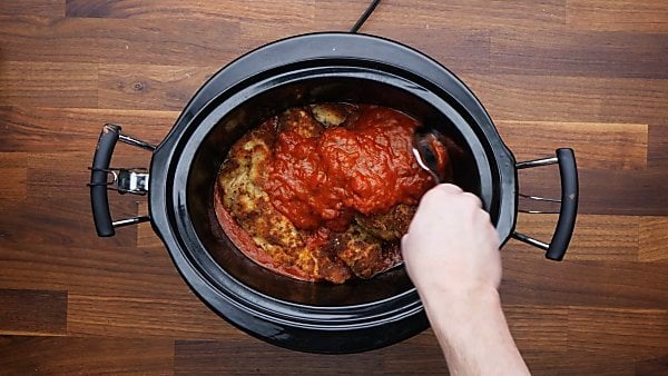 chicken and sauce in crockpot