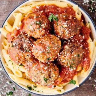 bowl of spaghetti with instant pot meatballs above