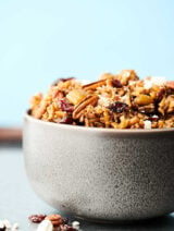 Instant Pot Wild Rice Stuffing. Can be made gluten free or vegan! Loaded with onion, celery, mushrooms, garlic, sage, thyme, rosemary, balsamic, cranberries, pecans, goat cheese, and parmesan! Quick and delicious! Perfect for a Thanksgiving side dish. showmetheyummy.com #instantpot #wildrice #stuffing #thanksgiving