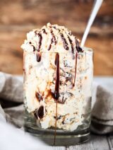 This No Churn Roasted S'Mores Ice Cream Recipe is insanely quick and easy to make and is loaded with hot fudge, roasted marshmallows, and crunchy graham crackers! Only 7 ingredients needed and NO ice cream machine required! showmetheyummy.com