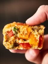 These Roasted Vegetable Breakfast Muffins make the perfect easy, healthy, make ahead breakfast! Whole eggs, egg whites, veggies: sweet potatoes, asparagus, bell pepper, onion -  and spices get baked into portable egg muffin cups! Gluten Free. Vegetarian! Less than 100 calories per muffin! showmetheyummy.com #healthy #eggmuffincups #roastedvegetables