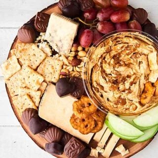 #ad This Sweet and Salty Snack Board is perfect for entertaining! As easy way to impress your guests! Full of chocolate, cheeses, fruit, crackers, and more! showmetheyummy.com Made in partnership w/ @godiva #GodivaMasterpieces