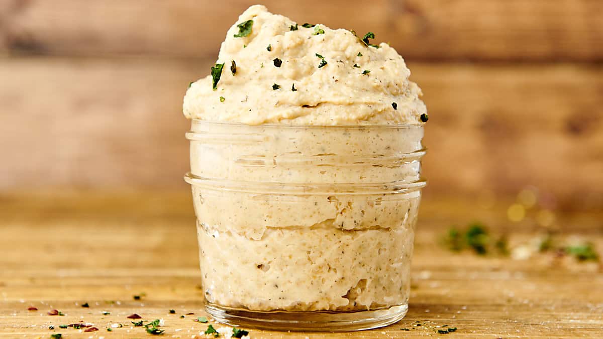 jar of vegan ricotta cheese made with cashews